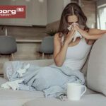 Kranke Frau auf Couch